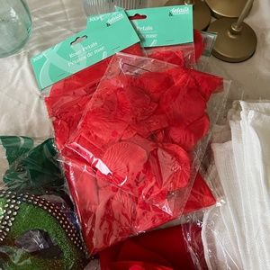 4 packs of 300 count faux rose petals